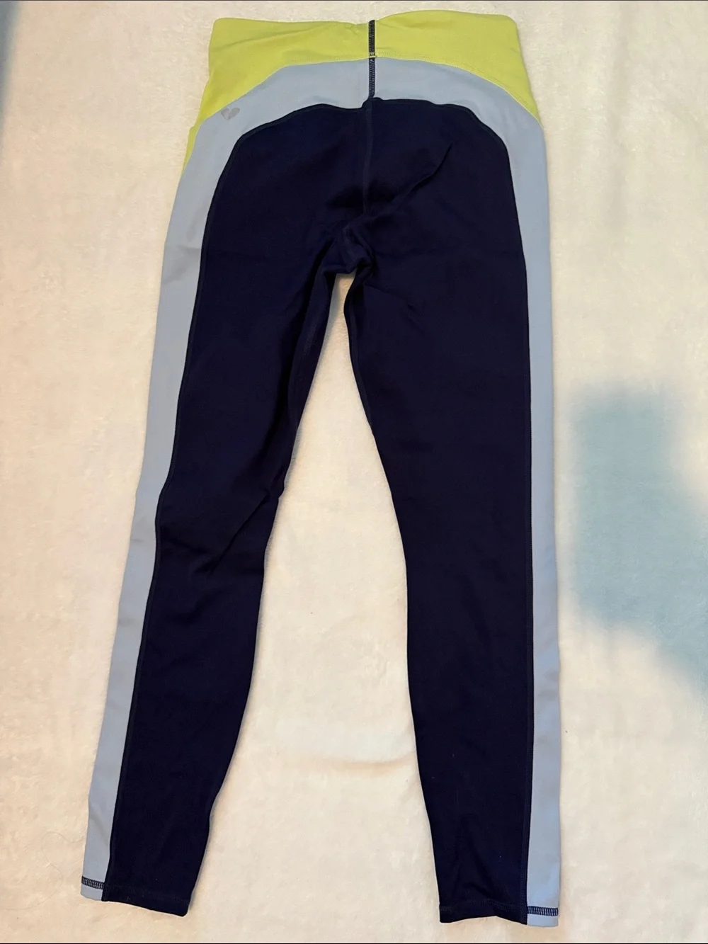 Woman’s fabletics navy Leggings with Lime Side Stripes. No tag but fits like a S